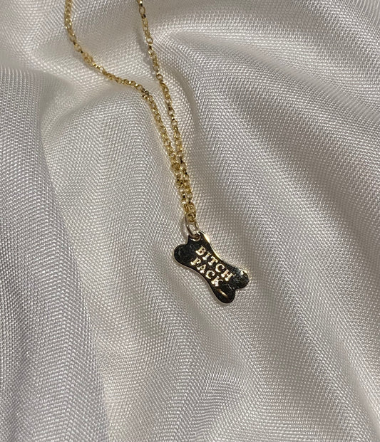 14k Gold Tiny Bitch Pack Pendant by equestrian jewelry designer Salina Ramsay.