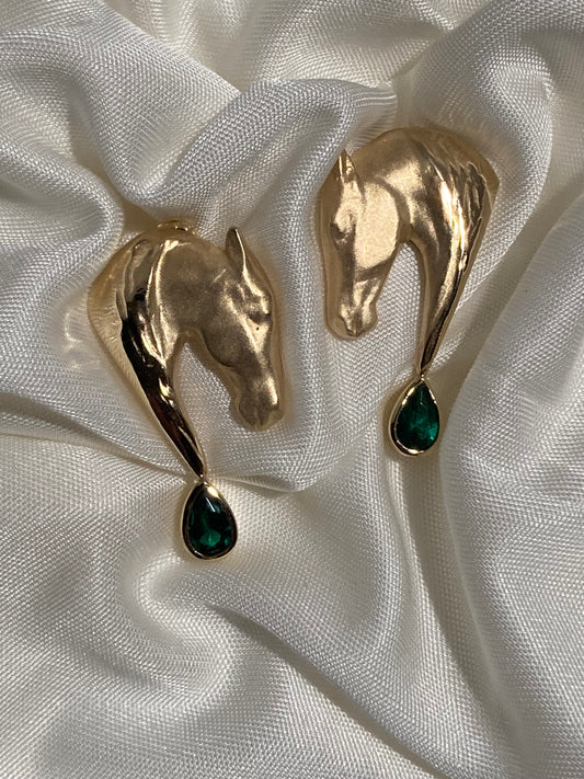 Handcrafted in solid 14k gold, the Corteggiando Horse Head Earrings capture the elegance of equine courtship in a timeless design inspired by the horse's enduring grace and beauty.