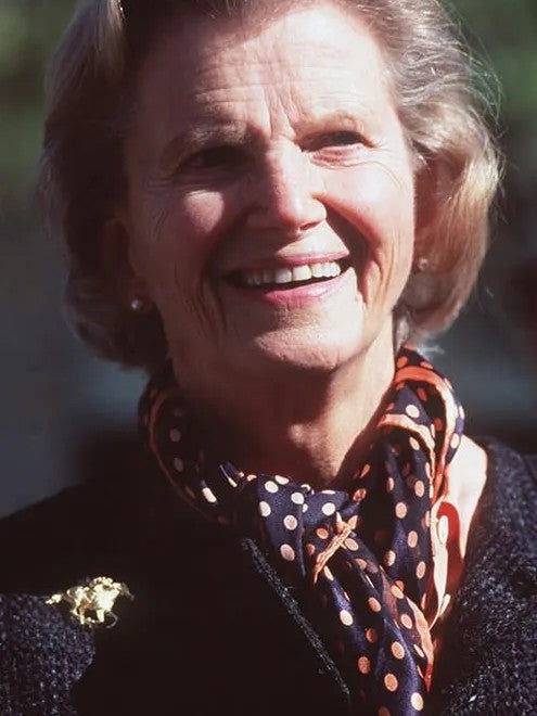 Penny Chenery wearing original 18k gold Secretariat pin designed by Salina Ramsay in 1998.