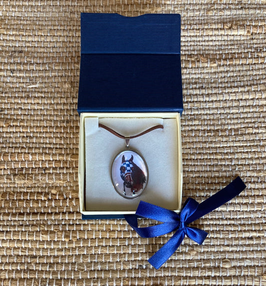 Secretariat Crystal Pendant featuring original equestrian artwork by Salina Ramsay beneath a crystal dome, inspired by the legendary Triple Crown champion.