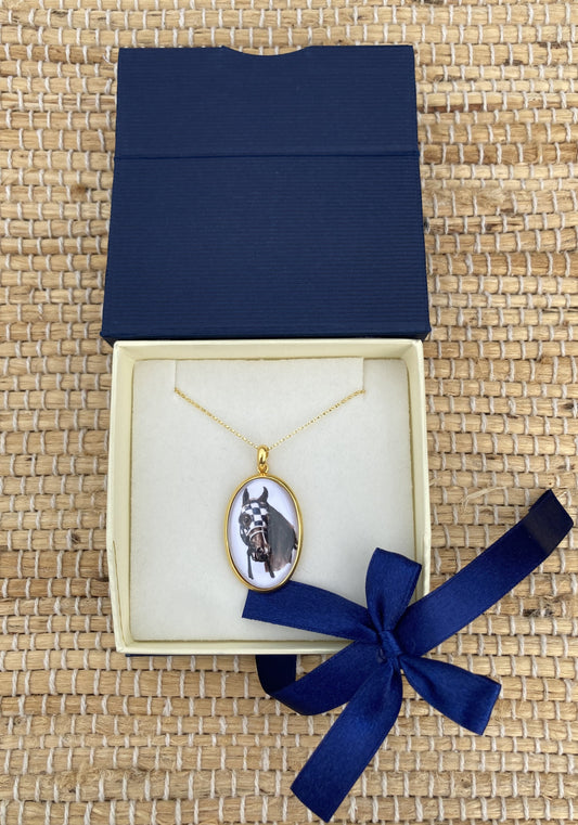 Secretariat Crystal Pendant featuring original equestrian artwork by Salina Ramsay beneath a crystal dome, inspired by the legendary Triple Crown champion.