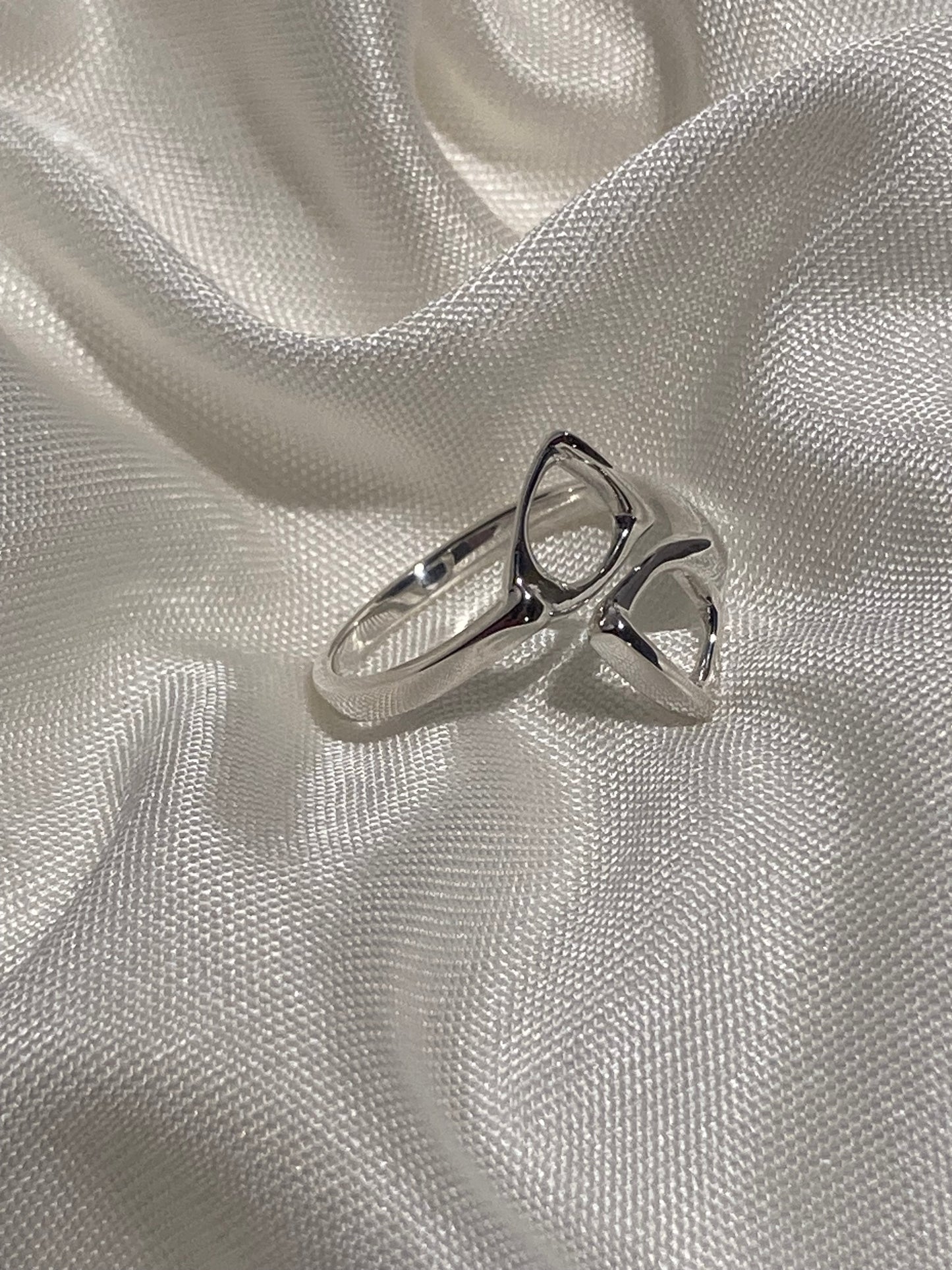 Sterling silver double stirrup ring by Salina Ramsay, handcrafted fine equestrian jewelry inspired by classic English riding stirrups.