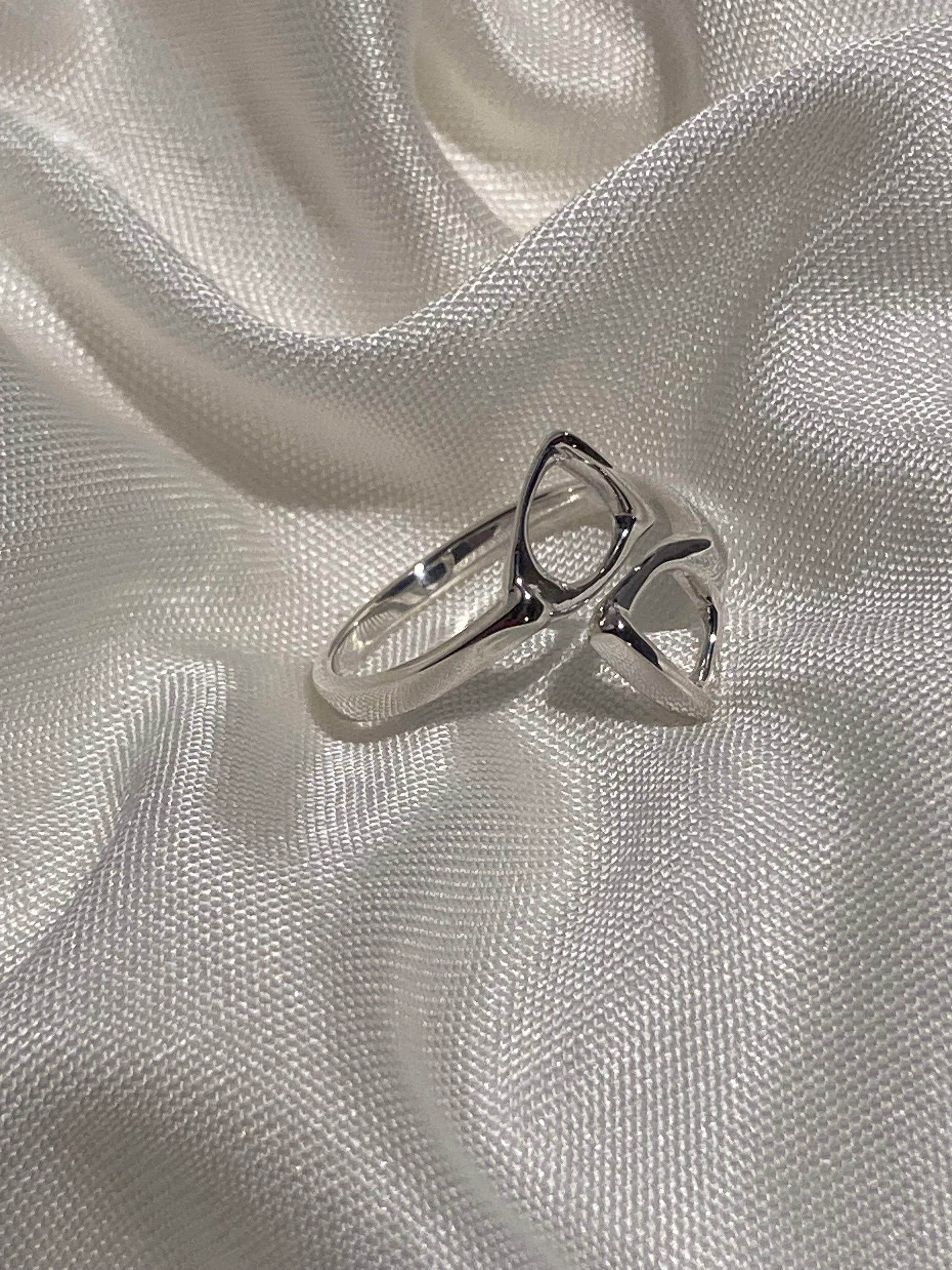 Sterling silver double stirrup ring by Salina Ramsay, handcrafted fine equestrian jewelry inspired by classic English riding stirrups.