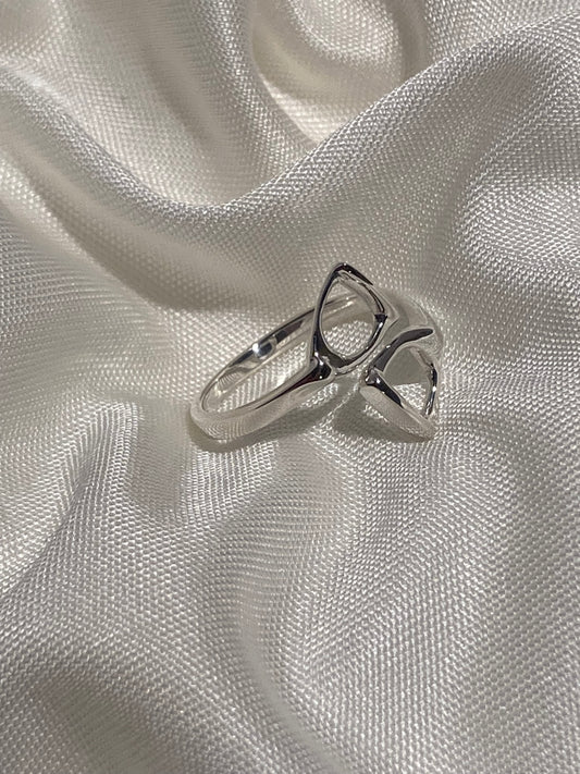 Sterling silver double stirrup ring by Salina Ramsay, handcrafted fine equestrian jewelry inspired by classic English riding stirrups.