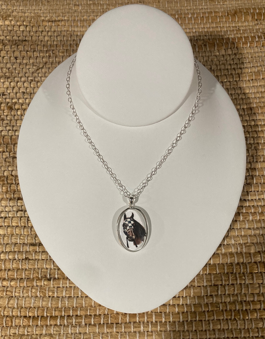 Secretariat Crystal Pendant in Sterling SIlver featuring original equestrian artwork by Salina Ramsay beneath a crystal dome, inspired by the legendary Triple Crown champion.