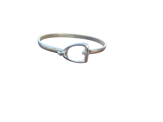 Sterling silver stirrup bracelet by Salina Ramsay Studio featuring a classic English riding stirrup design, handcrafted equestrian jewelry for riders and horse lovers.
