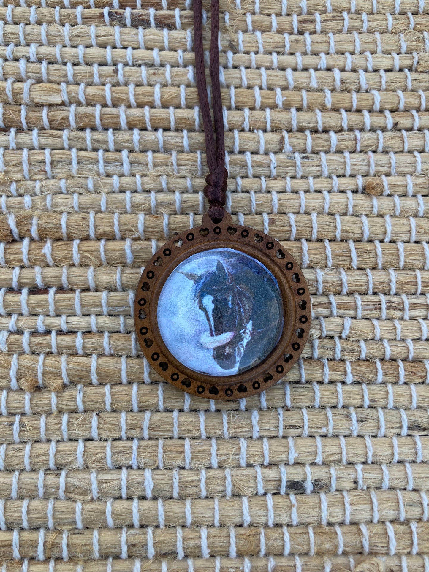 Zenyatta Equestrian Keepsake Pendant featuring original artwork by Salina Ramsay beneath a crystal setting.