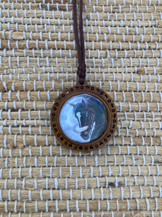 Zenyatta Equestrian Keepsake Pendant featuring original artwork by Salina Ramsay beneath a crystal setting.